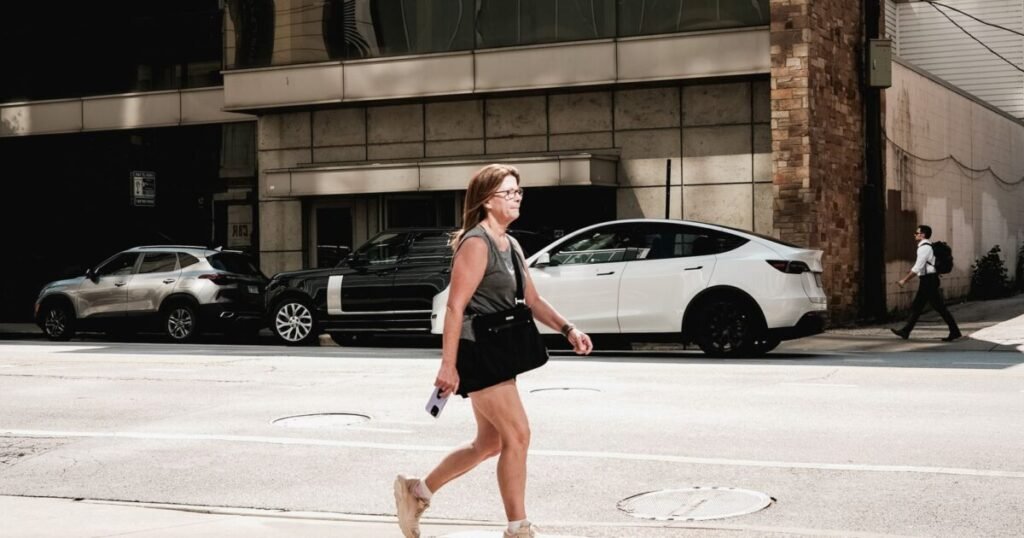 Woman walking through a Chicago neighborhood street - Laundry Pickup and Delivery by Chicago Neighborhood